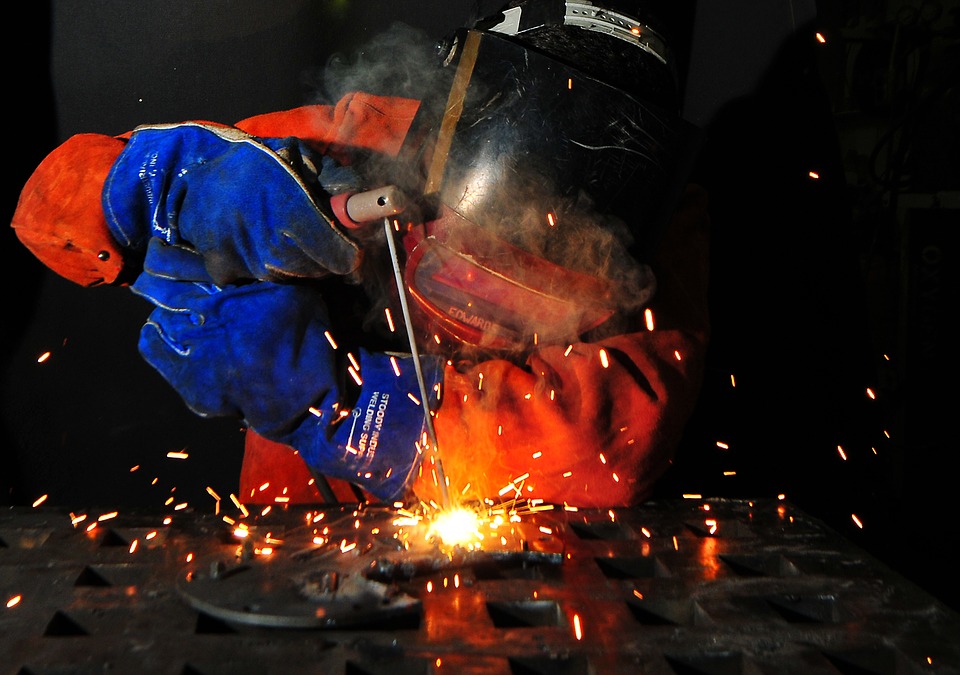 man welding